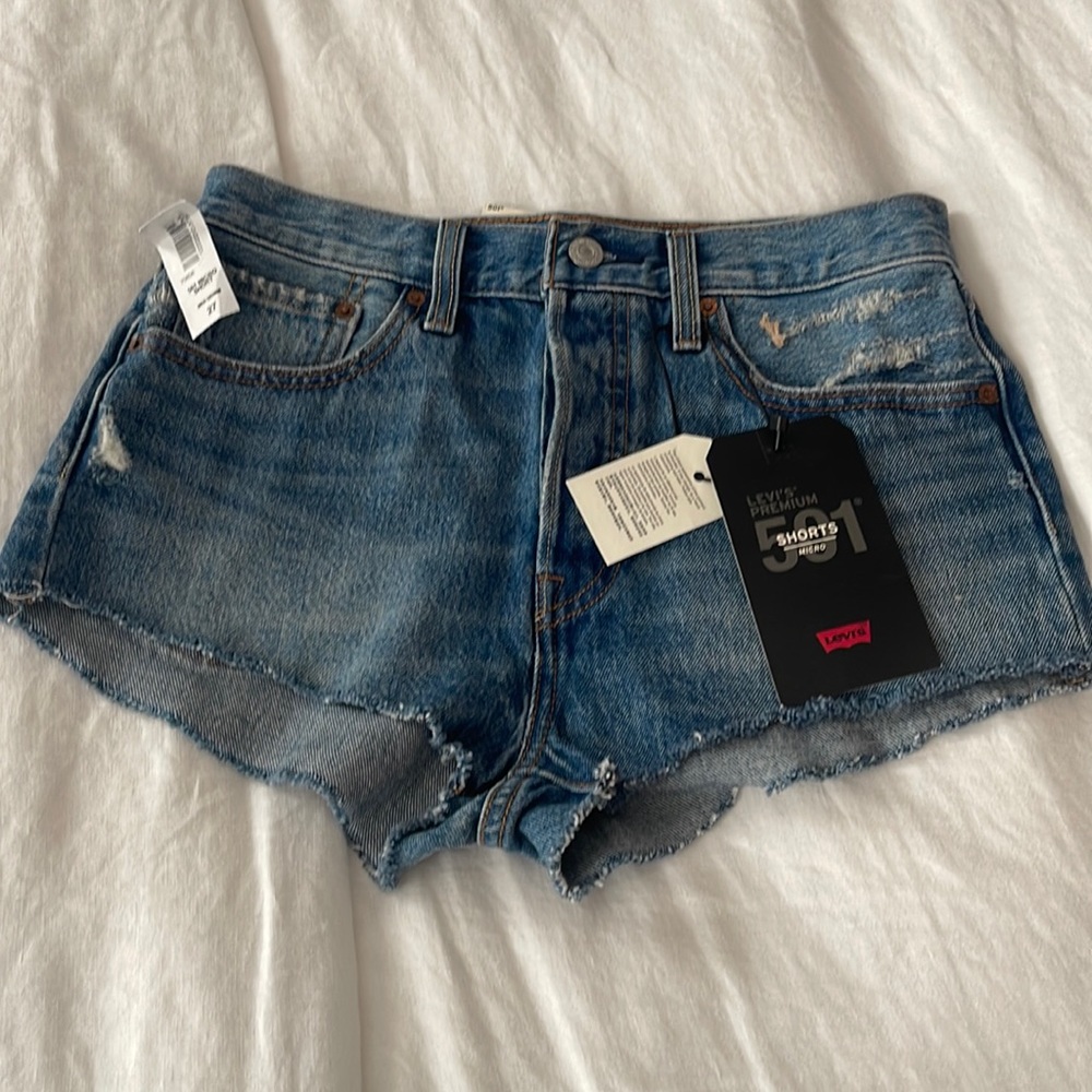 Levi’s micro, high rise super short. Never worn. Tags attached.
